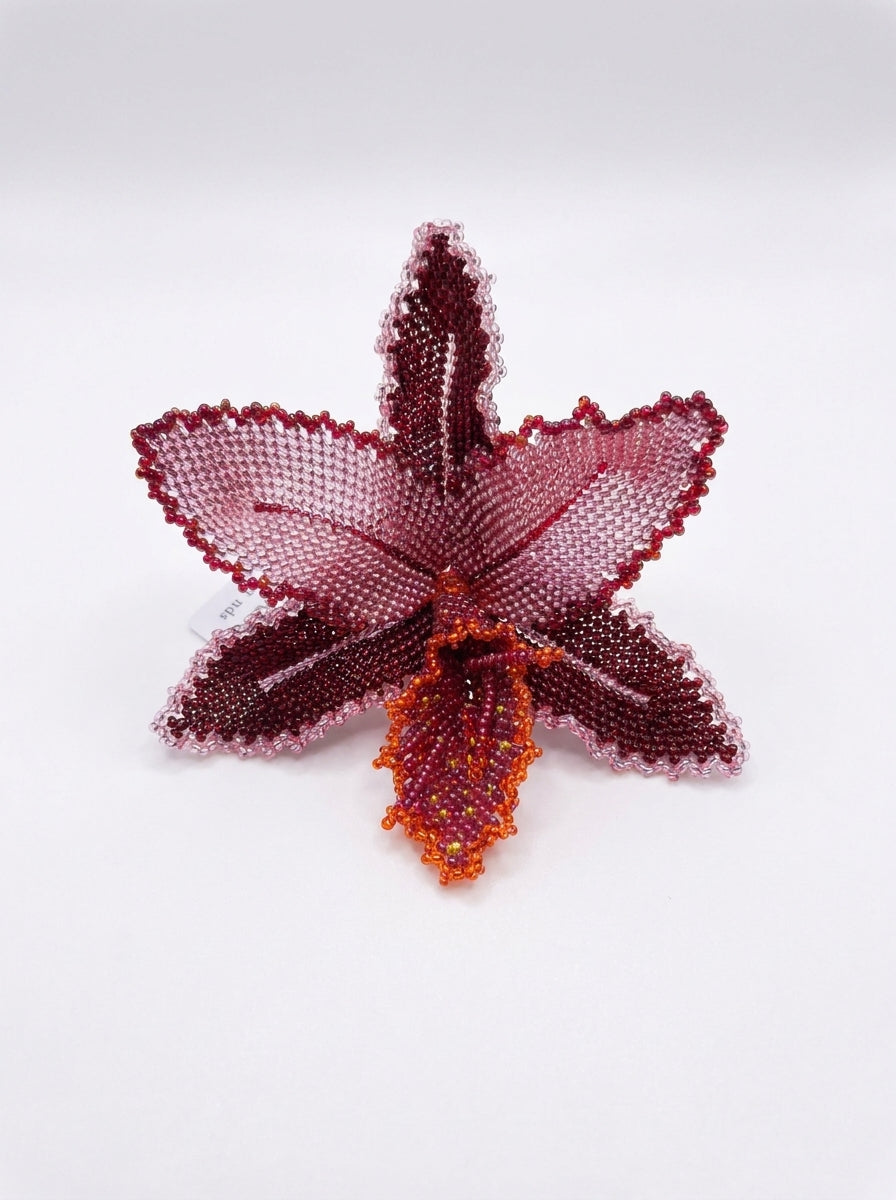 Tezoro Orchid red colored brooch