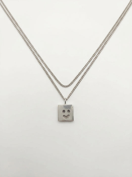 Fien Demuynck zilver juweel HAPPY-SAD ketting